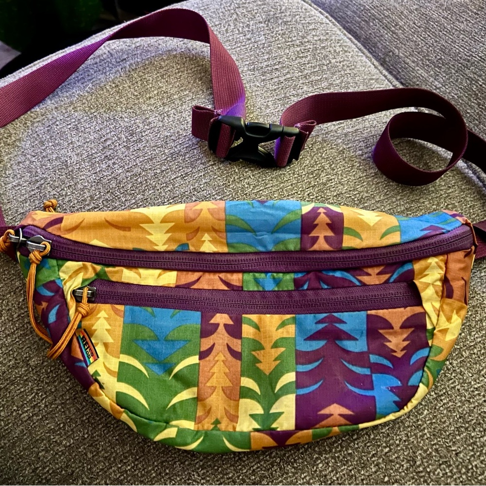 REI fanny pack. Tree pattern. Nylon. Very clean. Buckle closure.
